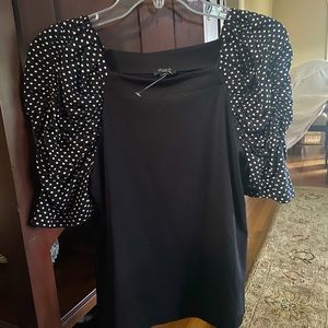 Ann Taylor black top with polka dot sleeves. Petite small.